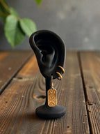 Boucles d’oreilles essentielles ◦ Carte third eye