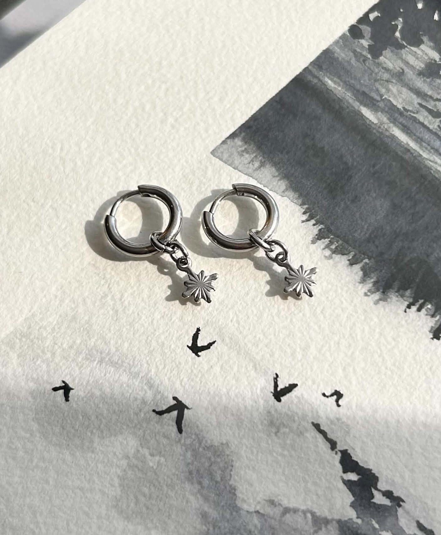 Boucles d’oreilles essentielles ◦ Tiny gold & silver star